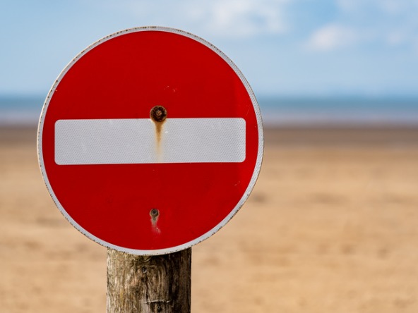 Stop sign on a beach